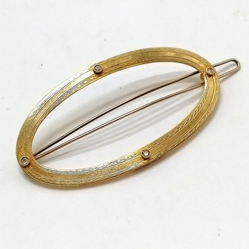 572 - Antique 18ct marked gold diamond set hair grip in a leather retail box - 6cm across & 8.3g total wei... 