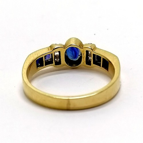 783 - 14ct gold marked sapphire and diamond ring with channel set diamond detail and princes cut sapphire ... 