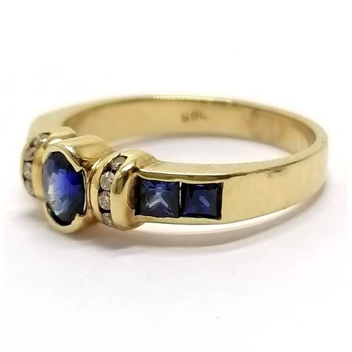 783 - 14ct gold marked sapphire and diamond ring with channel set diamond detail and princes cut sapphire ... 