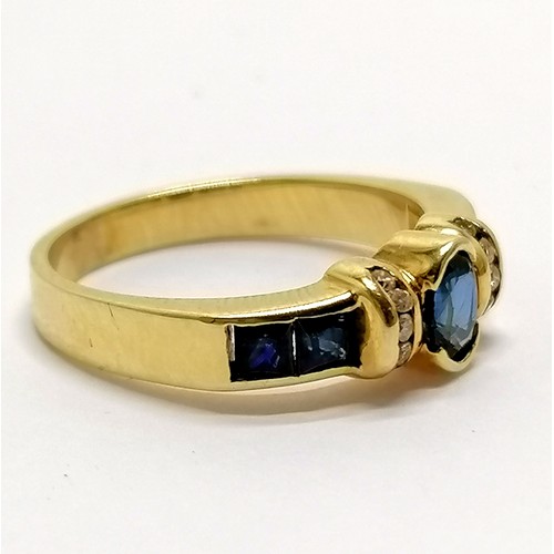 783 - 14ct gold marked sapphire and diamond ring with channel set diamond detail and princes cut sapphire ... 