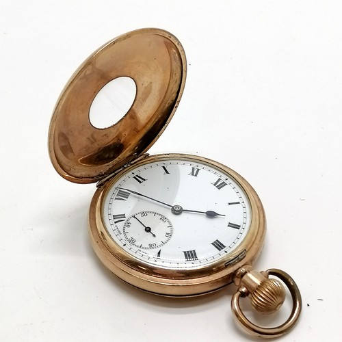 794 - Antique gold plated half hunter pocket watch in a Dennison 50mm case - running and has a couple of s... 