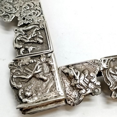 879 - Antique unmarked continental silver frame with unusual construction of cast panels depicting figural... 