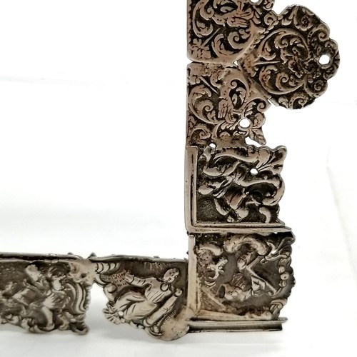 879 - Antique unmarked continental silver frame with unusual construction of cast panels depicting figural... 