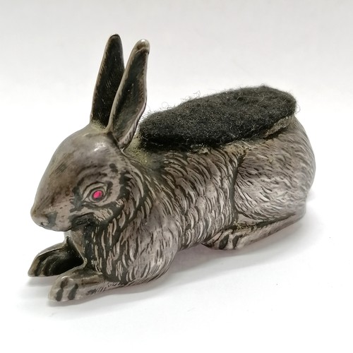 889 - Antique 1907 silver rabbit pin cushion with red glass eyes by Boots Pure Drug Company - 6.5cm long &... 