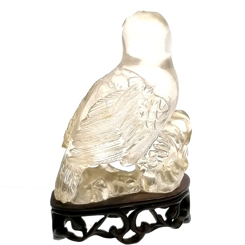 44 - Oriental carved rock crystal figure of a bird of prey on a hand carved wooden stand - total height 1... 