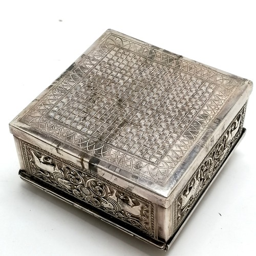 50 - Foreign silver marked table box with repousse decoration and wooden liner 9cm x 9cm x 4.5cm high 298... 