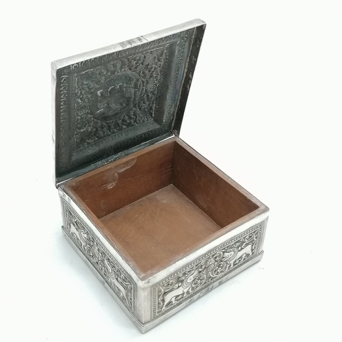 50 - Foreign silver marked table box with repousse decoration and wooden liner 9cm x 9cm x 4.5cm high 298... 