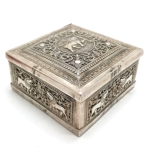 50 - Foreign silver marked table box with repousse decoration and wooden liner 9cm x 9cm x 4.5cm high 298... 