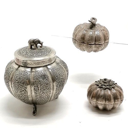 51 - 3 x oriental metal lidded boxes largest 11cm high with 3 fish shaped feet and an elephant finial all... 