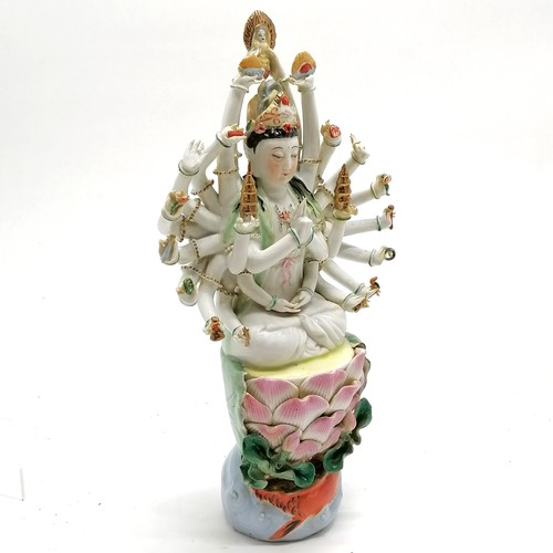 59 - Chinese republic period porcelain figure of deity with 24 arms seated on a lily pad with carp & wate... 