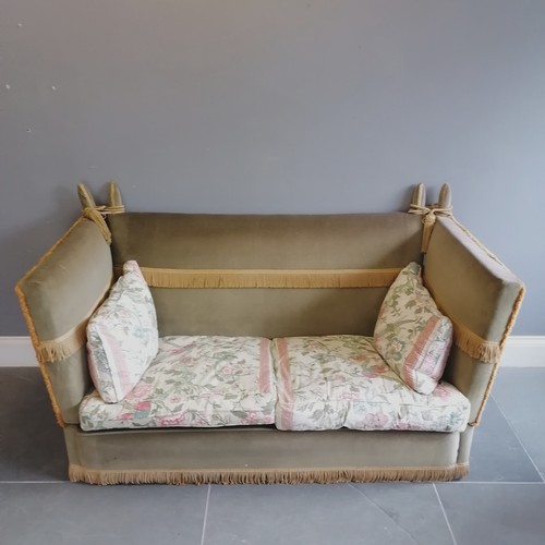 72 - Knowle 2 seater settee with drop ends, upholstered in a green plush, with Jane Churchill floral and ... 