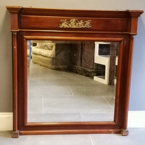 140 - French mahogany framed Empire influenced bevelled over mantle mirror, decorated with colums and a br... 