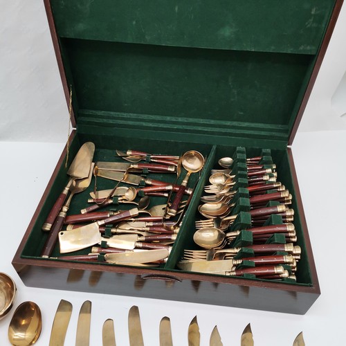 145 - Mahogany canteen of Royal Siam bronzeware cutlery, to include corn holders, cheese set, fish set etc... 