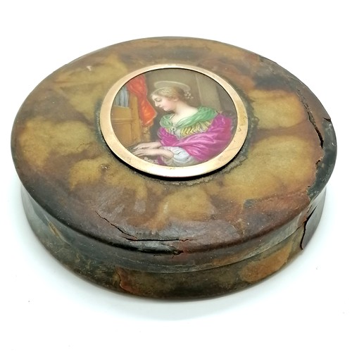 163 - Antique ciricular box with hand painted porcelain panel depicting a female saint playing a church or... 