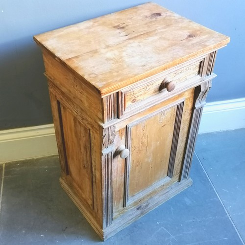 187 - Antique pine bedside cupboard, with carved decoration, single frieze drawer with cupboard under, hea... 