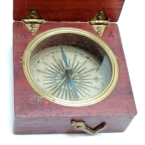 188 - Mahogany & brass hinged lidded compass with paper dial & blue steeled needle (5cm square) t/w circul... 