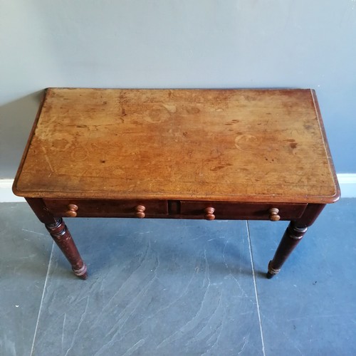 189 - Victorian mahogany side table with 2 short frieze drawers on turned supports, heavily water stained ... 