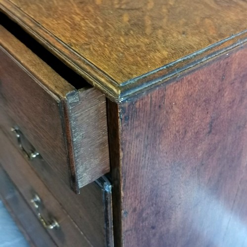 195 - Antique oak chest of 2 short and 3 long graduated drawers, with brass drop handles on bracket feet, ... 