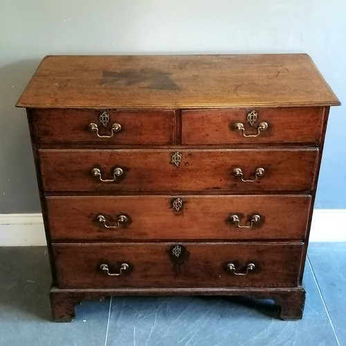 195 - Antique oak chest of 2 short and 3 long graduated drawers, with brass drop handles on bracket feet, ... 