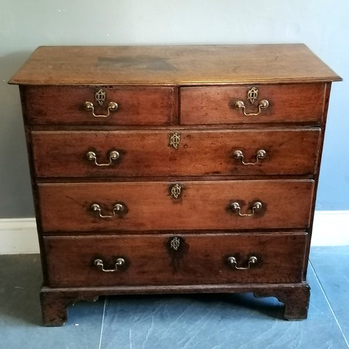 195 - Antique oak chest of 2 short and 3 long graduated drawers, with brass drop handles on bracket feet, ... 