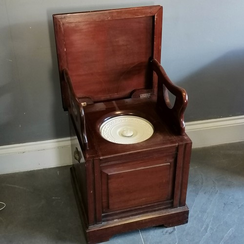 205 - Edwardian mahogany commode with folding arms, ceramic liner and lid, liner a/f, 49.5 cm wide, 46 cm ... 