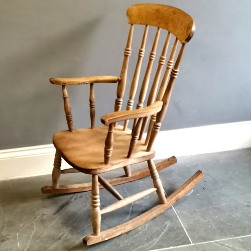 211 - Antique Elm Windsor country rocking chair, 58 cm wide, 77 cm deep, 100 cm high, signs of wear to arm... 