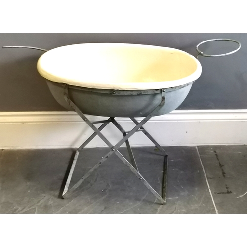 221 - Vintage fibreglass baby's bath on iron foldable frame, 65 cm wide 45 cm deep, 53 cm high, some scuff... 