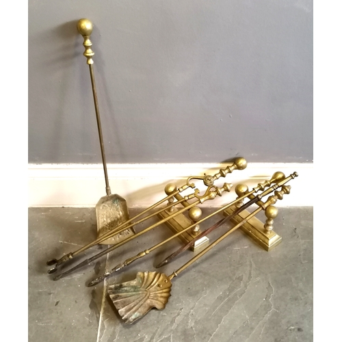 223 - Vintage brass fire irons, and another set similar, t/w pair of brass fire dogs.