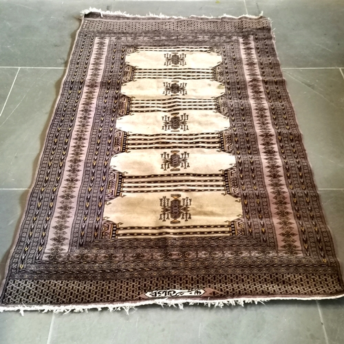 226 - Bokhara rug, with 5 central beige medallions with geometric design within borders of similar geometr... 