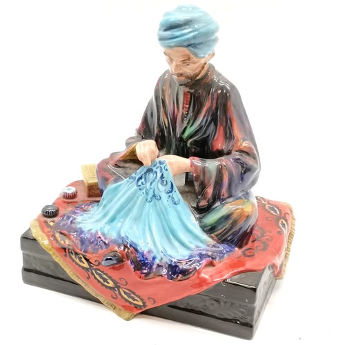 10 - Studio pottery figure by Reg Johnson of The Embroiderer of Kashmir 19 cm high & no obvious damage
~ ... 