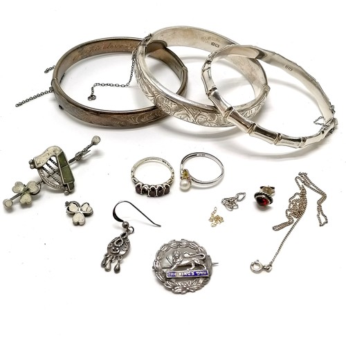 307 - 3 x silver bangles - plain one has dedication to inside & safety chains a/f, 2 antique brooches - (t... 