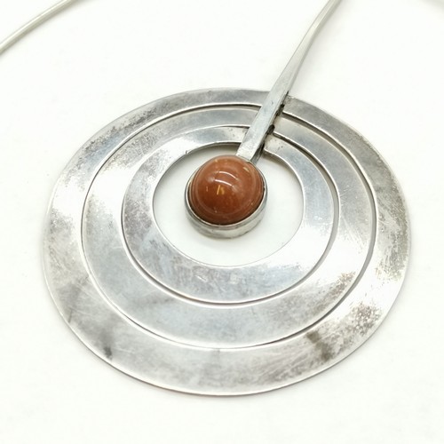 320 - Unusual unmarked silver handmade pendant set with cabochon stone 10cm drop on unmarked silver torque... 