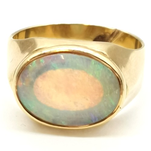 327 - 18ct marked gold marked opal stone set ring - 1.4cm across head & size Q½ & 6.2g total weight