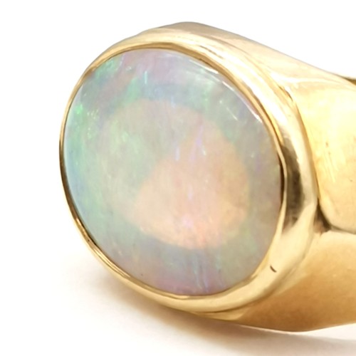 327 - 18ct marked gold marked opal stone set ring - 1.4cm across head & size Q½ & 6.2g total weight