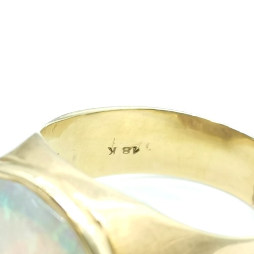 327 - 18ct marked gold marked opal stone set ring - 1.4cm across head & size Q½ & 6.2g total weight