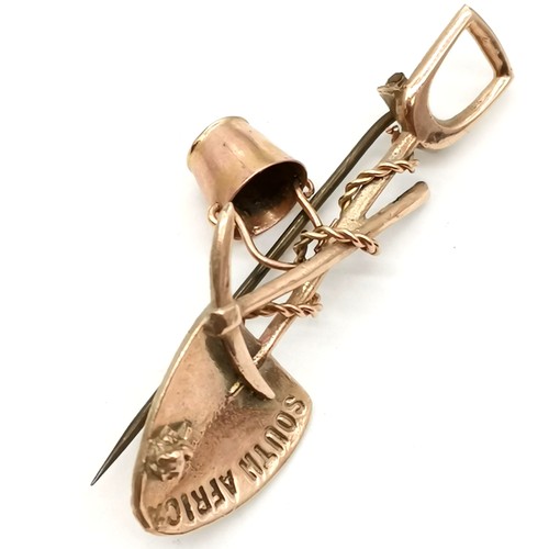 328 - Antique 9ct marked rose gold South Africa mining brooch in the form of a shovel, pickaxe & bucket (h... 