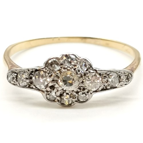 329 - Art Deco diamond cluster ring in unmarked gold mount - size Q½ & 1.5g total weight