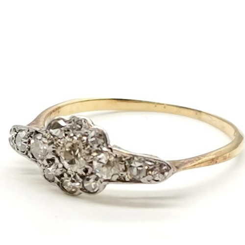 329 - Art Deco diamond cluster ring in unmarked gold mount - size Q½ & 1.5g total weight