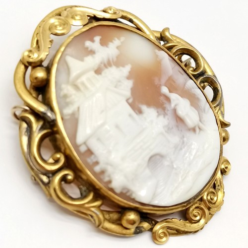 337 - 2 x antique hand carved cameo brooches - portrait brooch is 800 silver & the fancy gilt frame (6cm d... 