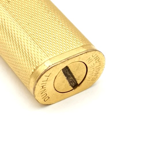 82 - Vintage Dunhill gold plated petrol lighter with engine turned case 7cm long has some losses to gold ... 