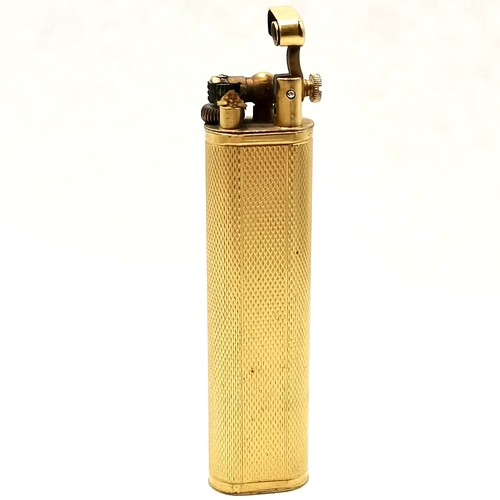 82 - Vintage Dunhill gold plated petrol lighter with engine turned case 7cm long has some losses to gold ... 