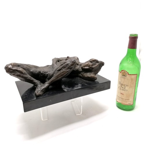 17 - Contemporary bronze figure of a nude lady reclining signed Dolov on a marble base (30cm x 16cm)