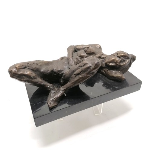 17 - Contemporary bronze figure of a nude lady reclining signed Dolov on a marble base (30cm x 16cm)