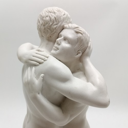 18 - Composite figure of 2 males embracing with octagonal shaped base bearing marks ©PV - 40cm high