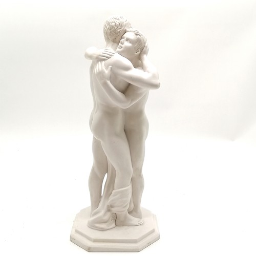 18 - Composite figure of 2 males embracing with octagonal shaped base bearing marks ©PV - 40cm high