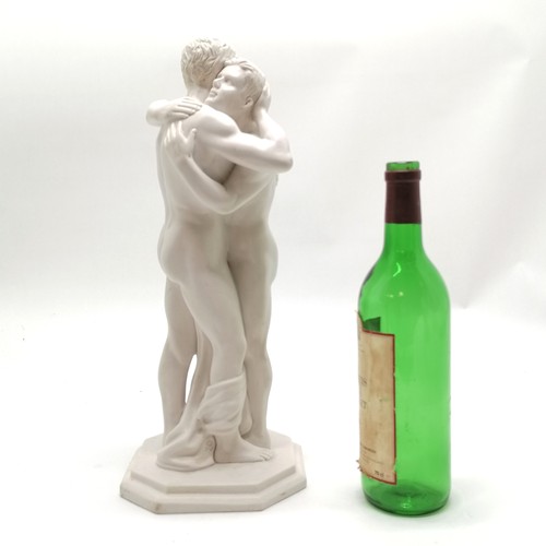 18 - Composite figure of 2 males embracing with octagonal shaped base bearing marks ©PV - 40cm high