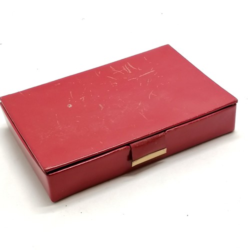 355 - Vintage small red jewellery box containing unmarked silver & paste brooch (6.5cm), sterling silver b... 