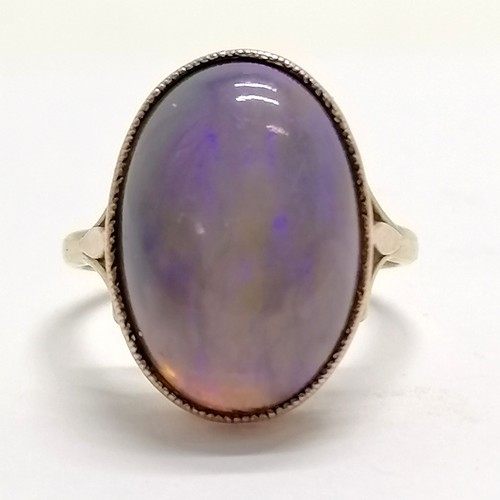 375 - 9ct marked gold cabochon opal stone set ring - size P½ & 4.8g total weight ~ stone has light surface... 