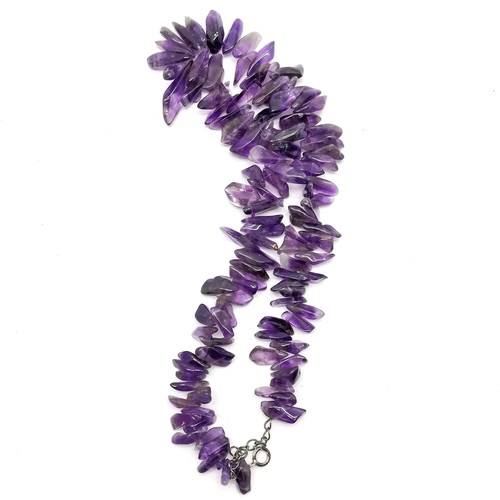 399 - Double strand of turquoise beads with silver and hardstone clasp (48cm), amethyst necklace, labrador... 