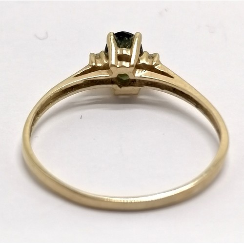 405 - 14ct marked gold diamond & dark green stone ring - size O & 1.1g total weight - SOLD ON BEHALF OF TH... 